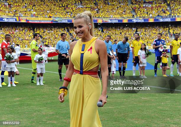 Colombian singer Fanny Lu performs before the start of the Brazil 2014 FIFA World Cup South American qualifier match between Colombia and Chile, in...