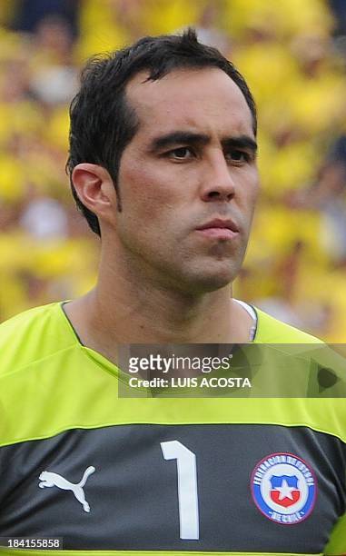Chile's goalkeeper Claudio Bravo is pictured before the start of the Brazil 2014 FIFA World Cup South American qualifier match against Colombia, in...