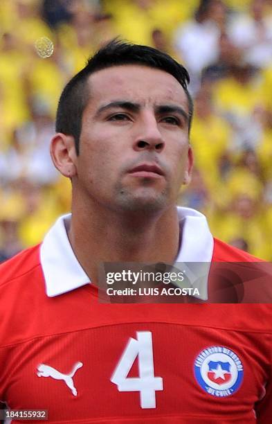 Chile's defender Mauricio Isla is pictured before the start of the Brazil 2014 FIFA World Cup South American qualifier match against Colombia, in...