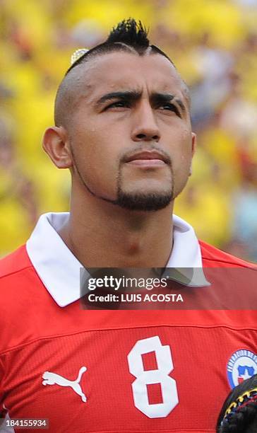 Chile's midfielder Arturo Vidal is pictured before the start of the Brazil 2014 FIFA World Cup South American qualifier match against Colombia, in...