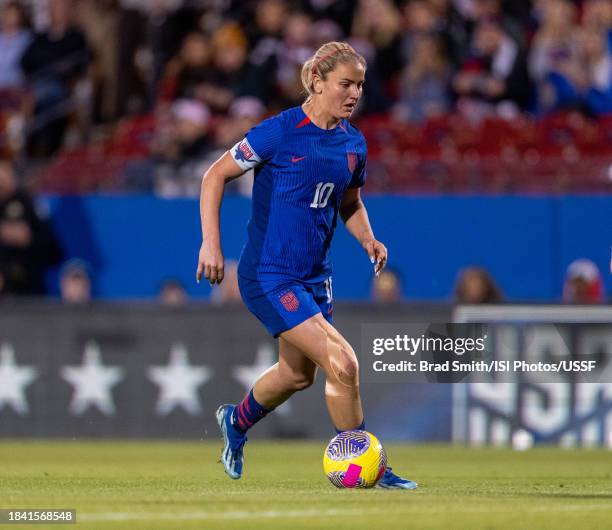 Lindsey Horan of the United States dribbles during a game between China and USWNT at Toyota Stadium on December 5, 2023 in Frisco, Texas.