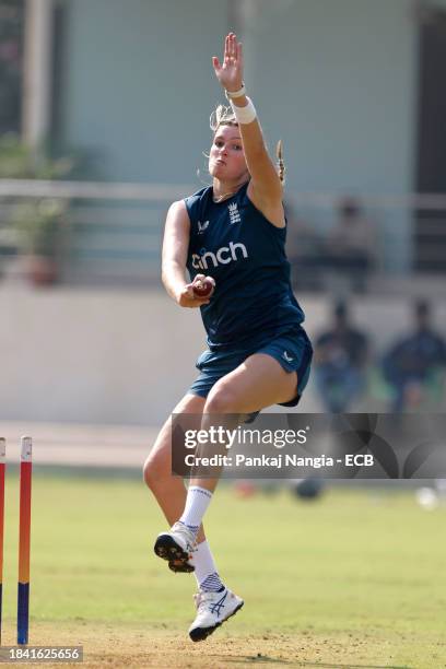 Lauren Bell of England delivers a ball during a net session at DY Patil Stadium on December 12, 2023 in Navi Mumbai, India.