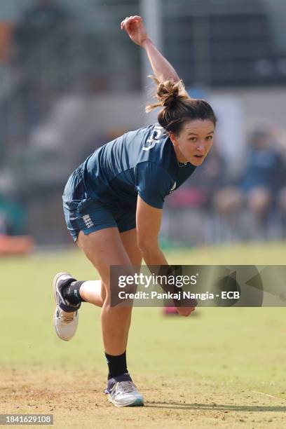 Kate Cross of England delivers a ball during a net session at DY Patil Stadium on December 12, 2023 in Navi Mumbai, India.