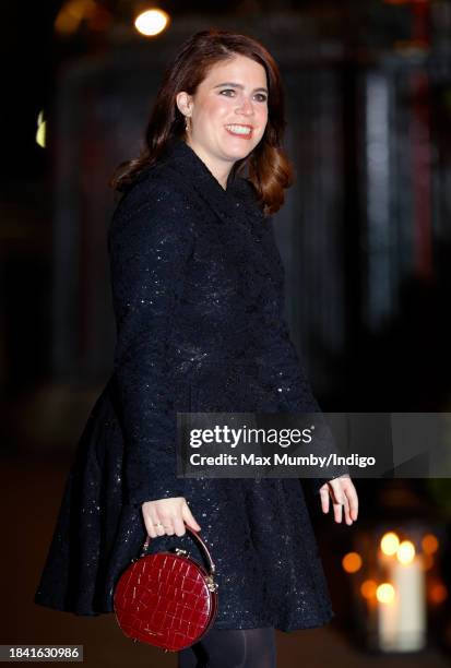 Princess Eugenie attends The 'Together At Christmas' Carol Service at Westminster Abbey on December 8, 2023 in London, England. Spearheaded by The...