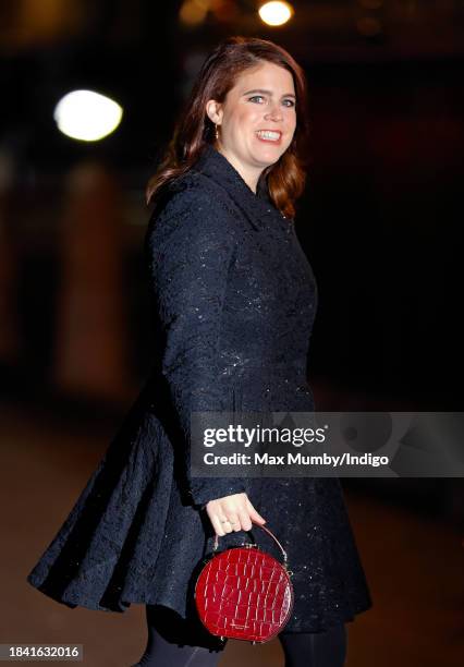 Princess Eugenie attends The 'Together At Christmas' Carol Service at Westminster Abbey on December 8, 2023 in London, England. Spearheaded by The...