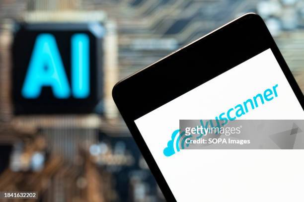 In this photo illustration, the Skyscanner logo seen displayed on a smartphone with an Artificial intelligence chip and symbol in the background.
