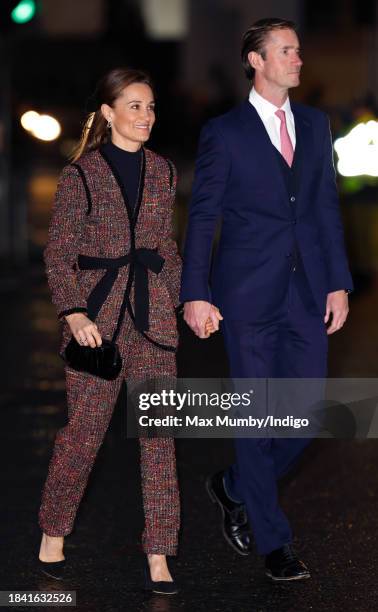 Pippa Matthews and James Matthews attend The 'Together At Christmas' Carol Service at Westminster Abbey on December 8, 2023 in London, England....