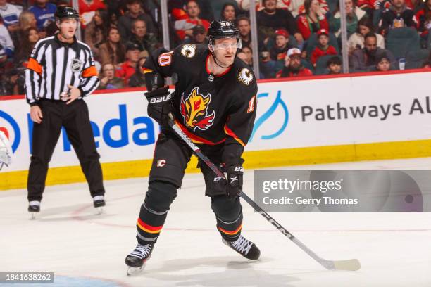 Jonathan Huberdeau of the Calgary Flames skates against the Vancouver Canucks at the Scotiabank Saddledome on December 02, 2023 in Calgary, Alberta.