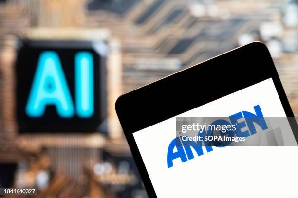 In this photo illustration, the American multinational biopharmaceutical company Amgen logo seen displayed on a smartphone with an Artificial...