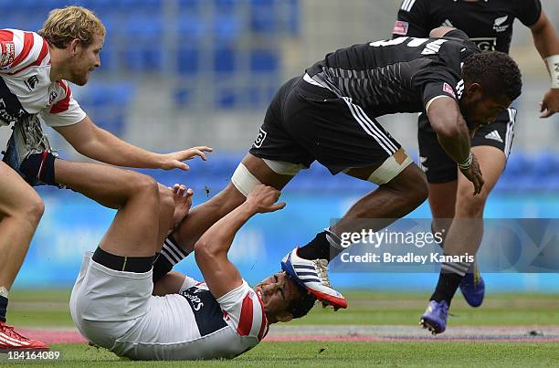 Lote Raikabula of the All Blacks takes on the defence during the Gold Coast Sevens round one match between the New Zealand All Blacks and the United...