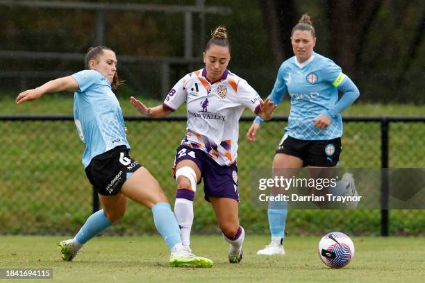 Leticia McKenna Melbourne City challenges Sally James of Perth Glory during the A-League Women round seven match between Melbourne City and Perth...