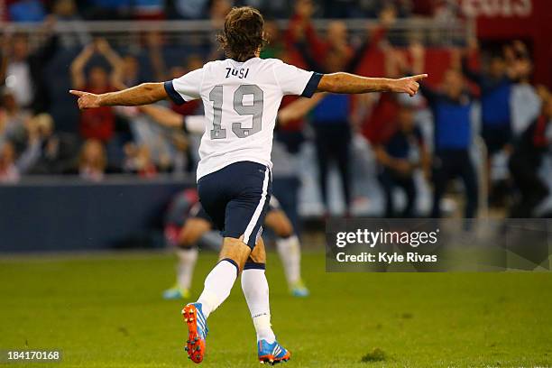 Graham Zusi of the U.S. Men's National Soccer Team celebrates after scoring the first goal of the game against Jamaica midway in the second half at...