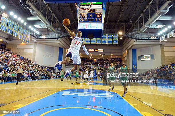 Vander Blue of the Philadelphia 76ers dunks against the Boston Celtics at the Bob Carpenter Center on October 11, 2013 in Newark, Delaware. NOTE TO...