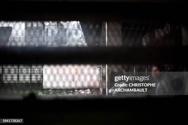 Inmates stand in the courtyard of the Bordeaux-Gradignan jail in Gradignan on the outskirts of Bordeaux on December 11, 2023.