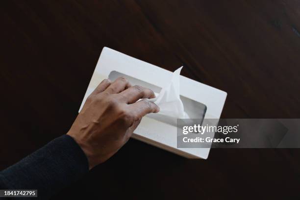 Tissue In Hand 385 Womans Hand Holding Tissue Stock Photos, High-Res Pictures, and ...