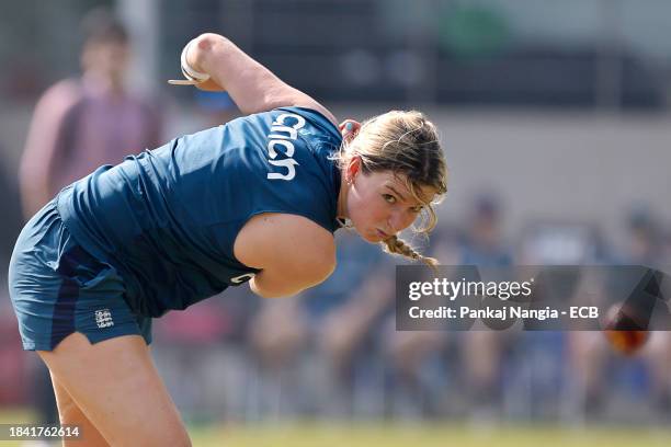 Lauren Bell of England delivers a ball during a net session at DY Patil Stadium on December 12, 2023 in Navi Mumbai, India.