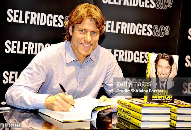 John Bishop meets fans and signs copies of his book 'How Did All This Happen? My Story' at Selfridges on October 11, 2013 in Manchester, England.