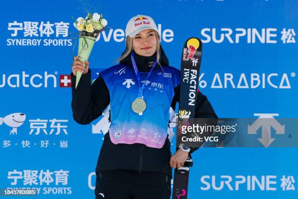 Gold medalist Ailing Eileen Gu of China celebrates during the medal ceremony for the Women's Freeski Halfpipe Final on day four of 2023-2024 FIS...