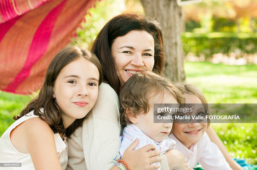 MOTHER with 2 boys and girl