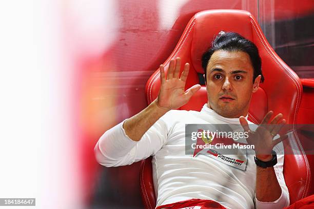 Felipe Massa of Brazil and Ferrari prepares to drive during the final practice session prior to qualifying for the Japanese Formula One Grand Prix at...