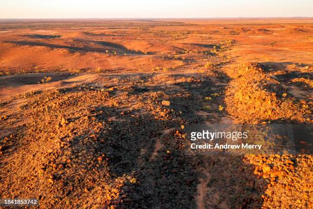 mars-like red rocky landscape aerial - sturt national park stock pictures, royalty-free photos & images