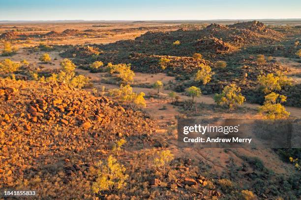 eroded rocky dry riverbed outback dusk australia - sturt national park stock pictures, royalty-free photos & images