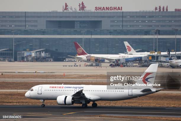 The third commercial flight of the C919, China's self-developed large passenger aircraft, arrives at Shanghai Hongqiao International Airport on...