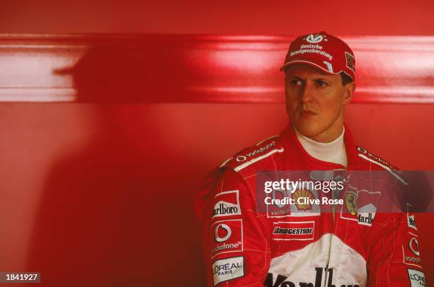 Portrait of Michael Schumacher of Germany and the Ferrari team in the garage before the Fosters Australian Formula One Grand Prix at Albert Park in...