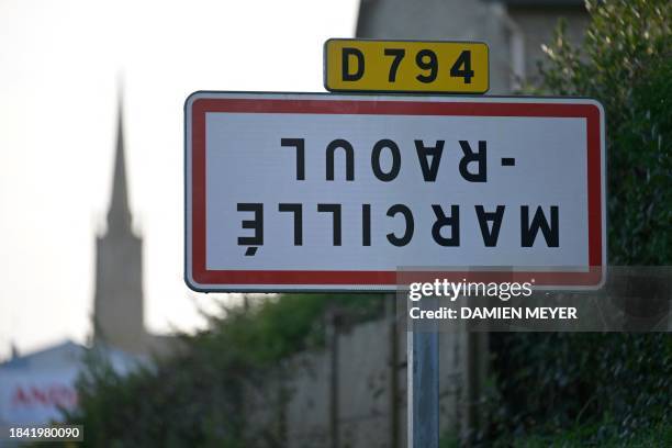 Photograph taken in Marcille-Raoul on December 12, 2023 shows a road sign indicating the exit of the French city of Montreuil-sur-Ille, western...