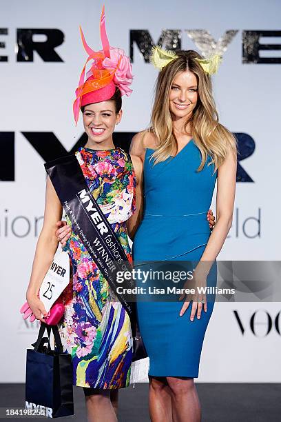 Winner Kelli Odell and judge Jennifer Hawkins pose during fashions on the field at Spring Champion Stakes day at Royal Randwick on October 12, 2013...