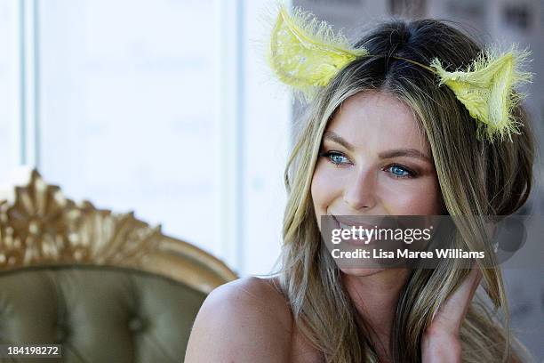 Jennifer Hawkins poses inside the Moet and Chandon Marquee during Spring Champion Stakes Day at Royal Randwick on October 12, 2013 in Sydney,...