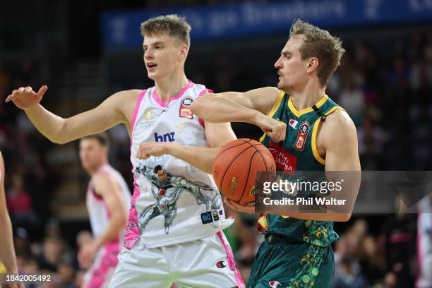 Anthony Drmic of the Tasmania JackJumpers is put under pressure from Cameron Gliddon of the New Zealand Breakers during the round 10 NBL match...