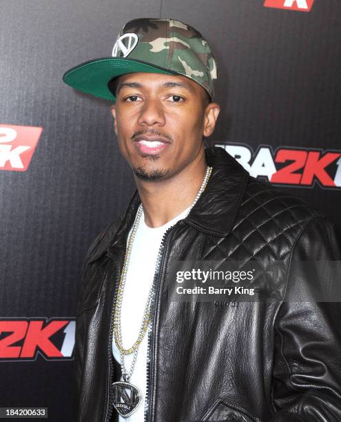 Personality Nick Cannon attends the NBA 2K14 premiere party on September 24, 2013 at Greystone Manor Supperclub in West Hollywood, California.