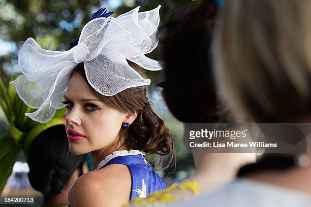 Fashions of the Field contestant waits to grace the stage during Spring Champion Stakes Day at Royal Randwick on October 12, 2013 in Sydney,...