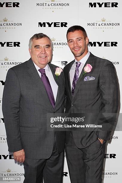 Bernie Brookes and Kris Smith pose inside the Moet and Chandon Marquee during Spring Champion Stakes Day at Royal Randwick on October 12, 2013 in...