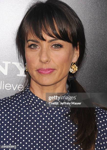 Actress Constance Zimmer arrives at the Los Angeles premiere of 'Elysium' at Regency Village Theatre on August 7, 2013 in Westwood, California.