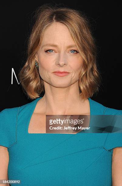 Actress Jodie Foster arrives at the Los Angeles premiere of 'Elysium' at Regency Village Theatre on August 7, 2013 in Westwood, California.
