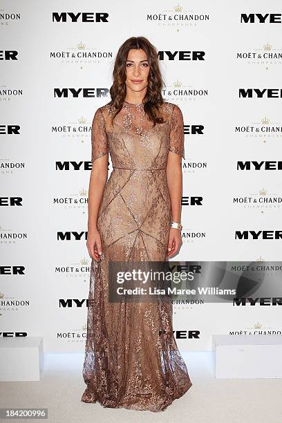 Cat Vas poses inside the Moet and Chandon Marquee during Spring Champion Stakes Day at Royal Randwick on October 12, 2013 in Sydney, Australia.