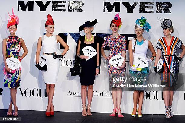 Fashions of the field contestants parade for the judges during Spring Champion Stakes Day at Royal Randwick on October 12, 2013 in Sydney, Australia.