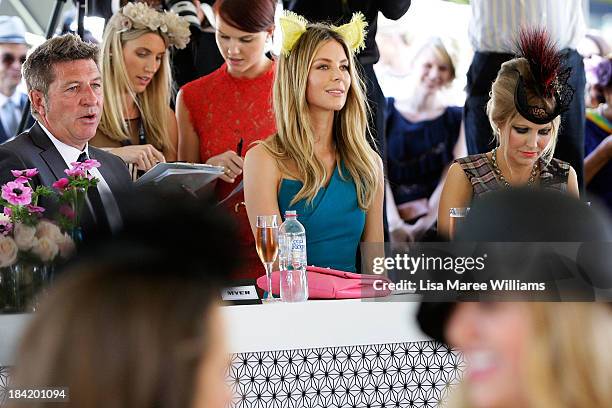 Wayne Cooper, Jennifer Hawkins and Nerida Winter judge fashions on the field on Spring Champion Stakes Day at Royal Randwick on October 12, 2013 in...