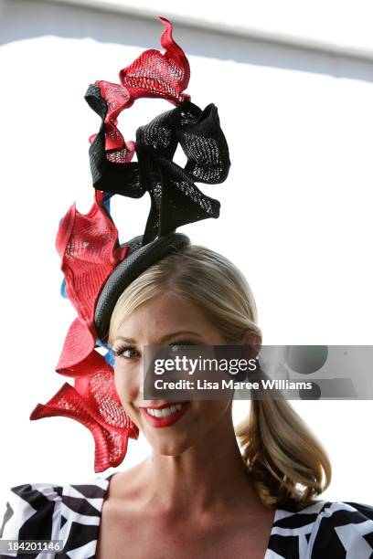 Fashions on the field contestant waits to grace the stage during Spring Champion Stakes Day at Royal Randwick on October 12, 2013 in Sydney,...