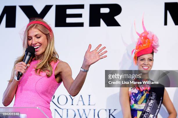 Laura Csortan hosts fashions on the field on Spring Champion Stakes Day at Royal Randwick on October 12, 2013 in Sydney, Australia.
