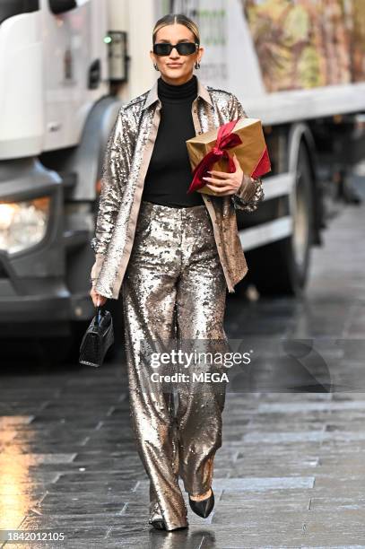 Ashley Roberts is seen leaving Global Studios on December 12, 2023 in London, United Kingdom.