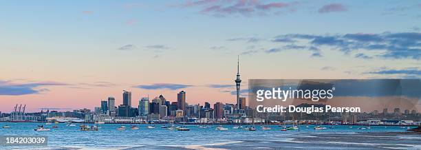 city skyline & waitemata harbour at dusk - auckland skyline stock pictures, royalty-free photos & images