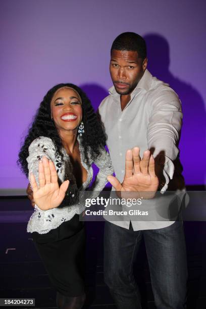 Valisia LeKae as "Diana Ross" and Michael Strahan pose backstage at "Motown The Musical" on Broadway at The Lunt Fontanne Theater on October 11, 2013...