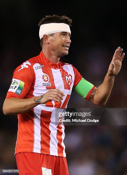 Harry Kewell of the Heart reacts after a shot at goal during the round one A-League match between the Melbourne Victory and the Melbourne Heart at...