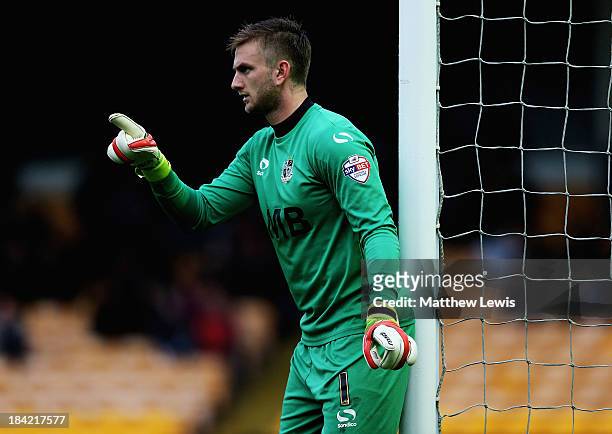 Chris Neal of Port Vale in action during the Sky Bet League One match between Port Vale and Peterborough United at Vale Park on October 12, 2013 in...