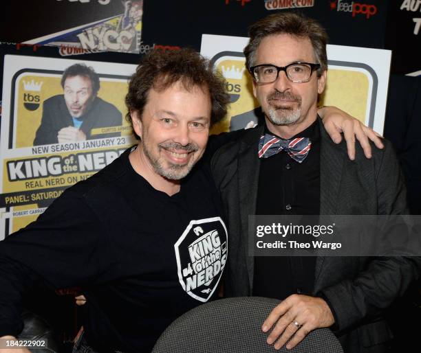 Curtis Armstrong and Robert Carradine attend the King of the Nerds signing during New York Comic Con 2013 at the Javits Center on October 12, 2013 in...