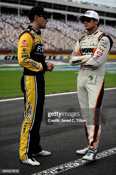 James Buescher, driver of the The Fraternal Order of Eagles Chevrolet, and Nelson Piquet Jr., driver of the WORX Chevrolet, during qualifying for the...