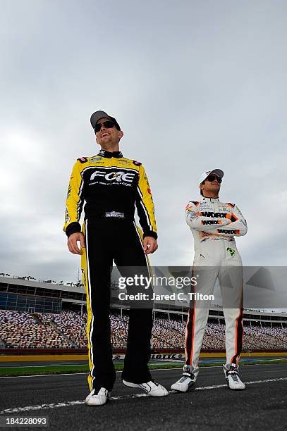 James Buescher, driver of the The Fraternal Order of Eagles Chevrolet, and Nelson Piquet Jr., driver of the WORX Chevrolet, during qualifying for the...